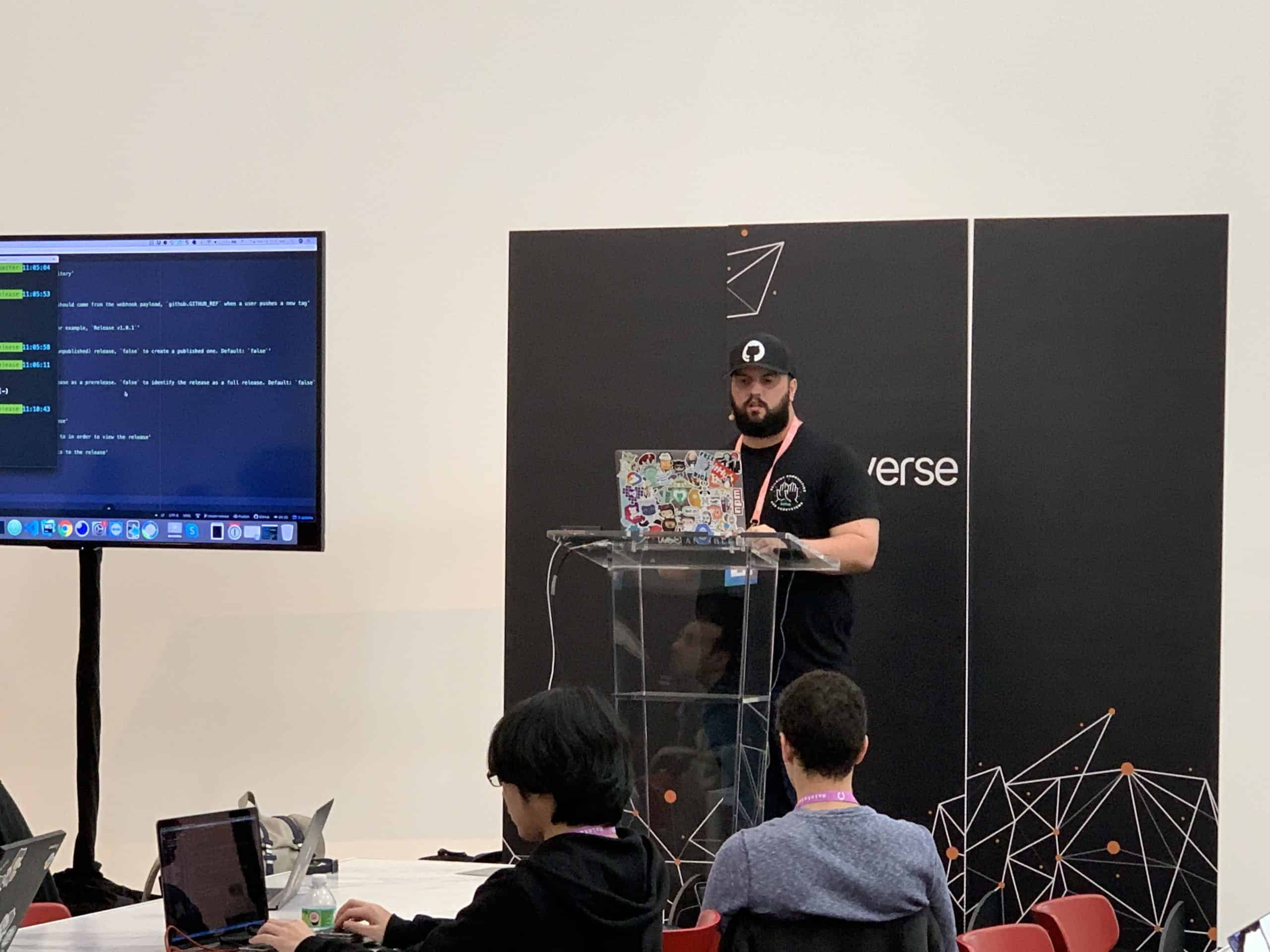 Thomas Hughes speaking at GitHub Universe delivering a workshop Thomas Hughes speaking at GitHub Universe delivering a workshop